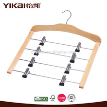 space-saving wooden skirt hanger with 4 tiers of metal clips